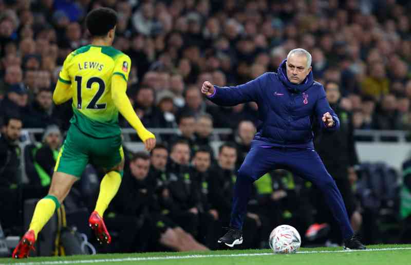 Lewis tears down the touchline, with José Mourinho, the former Tottenham Hotspur manager, standing in his way